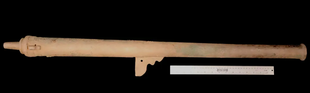 Weapon against black backdrop