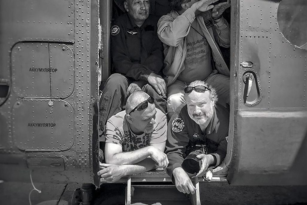 Bill Ingalls and others in helicopter