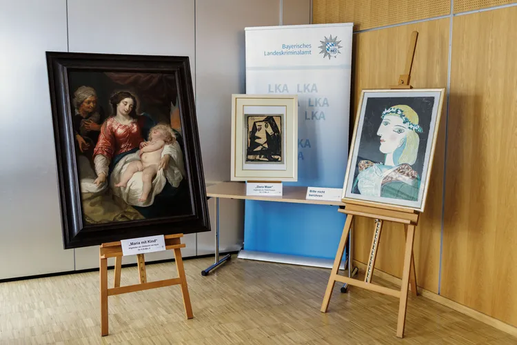 Three of the counterfeit paintings confiscated by Bavarian authorities