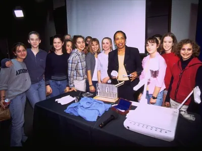 Ophthalmologist Dr. Patricia Bath poses with students at the National Museum of American History in 2000. (National Museum of American History, Archives Center.)