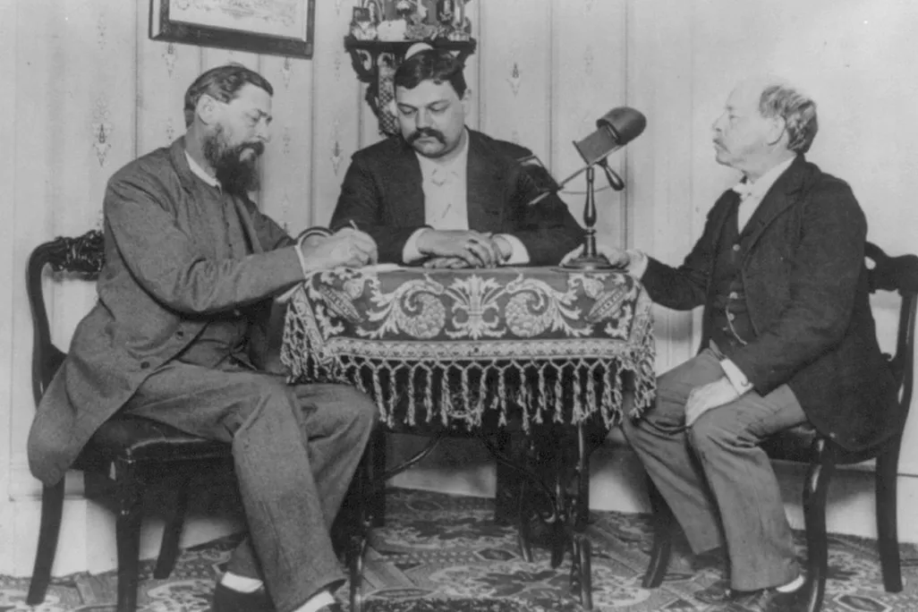 An 1889 photograph of author Horatio Alger (right)