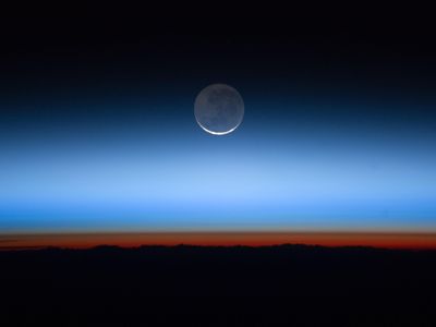 International Space Station astronauts captured this photograph of Earth's atmospheric layers. The troposphere is the orange-red layer. The gray, just above that, is the stratosphere. Then, the blue is the mesosphere.