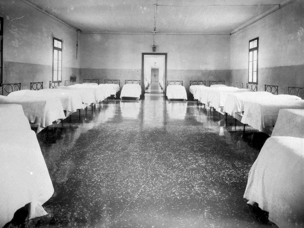 A dormitory at the San Servolo psychiatric hospital in Venice in the early 1900s