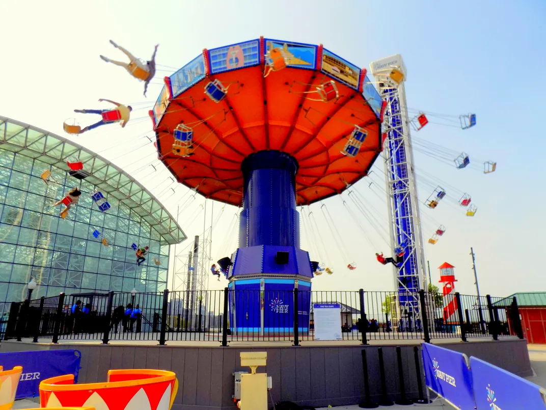 People on a swig ride