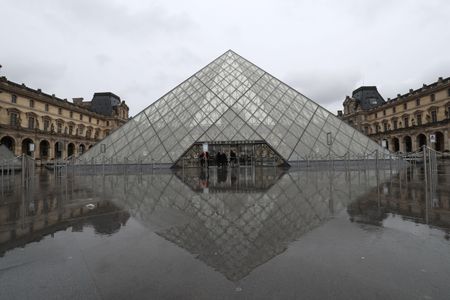 A view of the deserted courtyard outside the closed Louvre