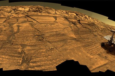 In this synthetic image, the Opportunity Mars rover explores Endurance Crater.