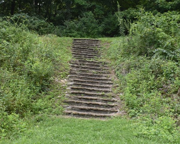 Rock steps up a hill to a terrace thumbnail