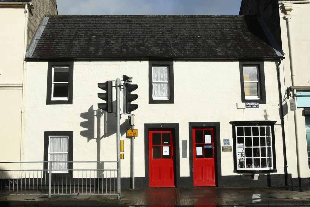 White building with red doors