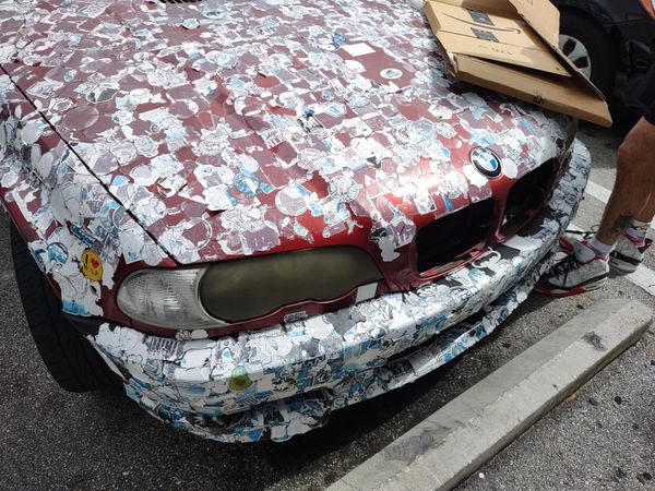 BMW covered in stickers thumbnail