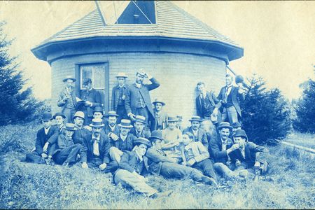 A group poses in front of Michigan State University's first observatory, circa 1888.