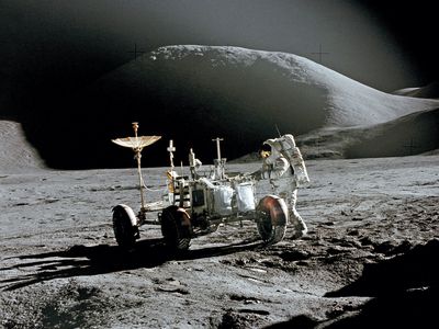 Jim Irwin and rover on moon