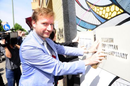 Tim Renner, undersecretary of state for cultural affairs, at a 2016 press conference for the Urban National Museum for Urban Contemporary Art.