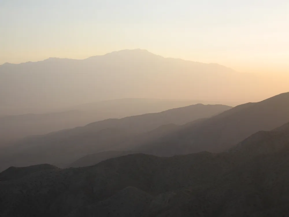 Hazy sunset with mountains