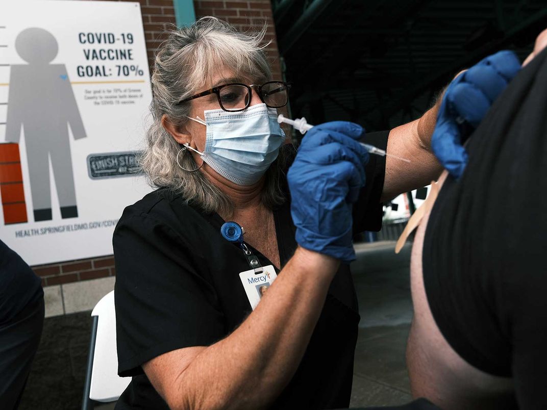 Nurse Administering a Covid Vaccine