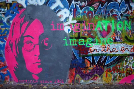 The Lennon Wall, a public art landmark in Prague. This picture was taken in 2010, and shows the wall before it was painted almost completely white on November 17, 2014.