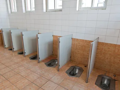 China has vowed to build over 50,000 new toilets and refurbish 100,000 more in a bid to improve sanitation for tourists. 