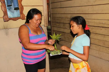 The show honors the "living legacy” of Native peoples (above: Idalis Ramírez Rojas and her daughter Ingrid of eastern Cuba) in the Spanish-speaking Caribbean and on the U.S. mainland.

 