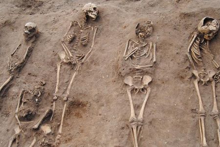 Archaeologists unearthed the remains of at least 48 individuals, including 27 children.