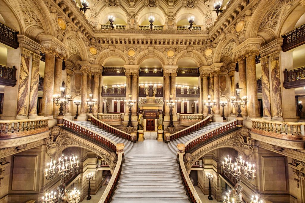 Opulent gold interior with a staircase