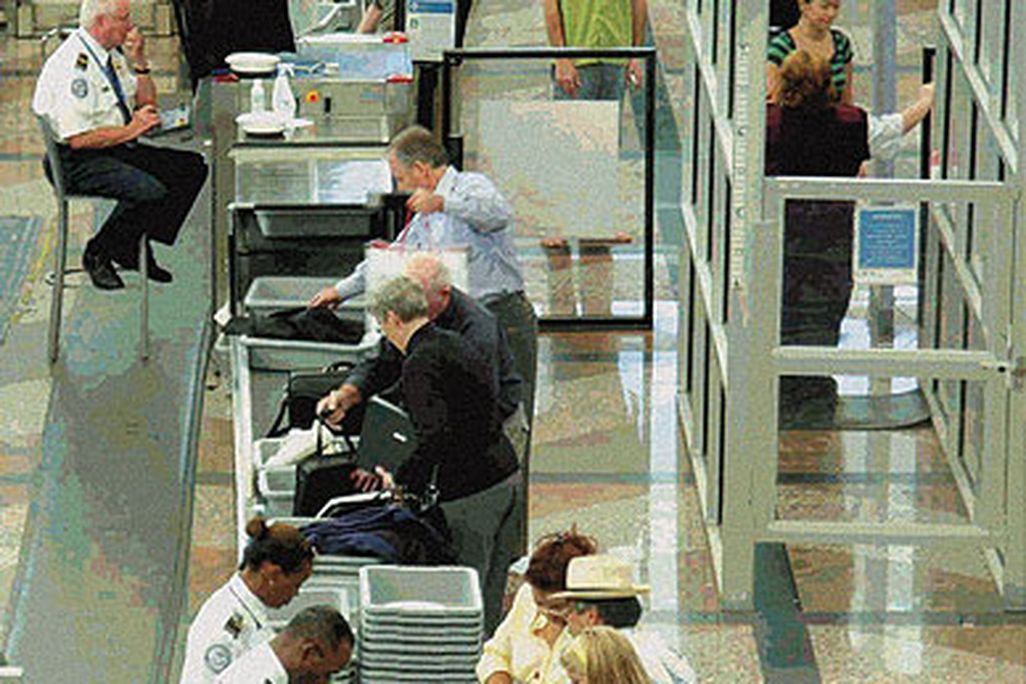 Right of Passage: In contrast to the early days of commercial airline travel, today, airport security officers screen passengers and their carry-on baggage in an effort to prevent attacks.