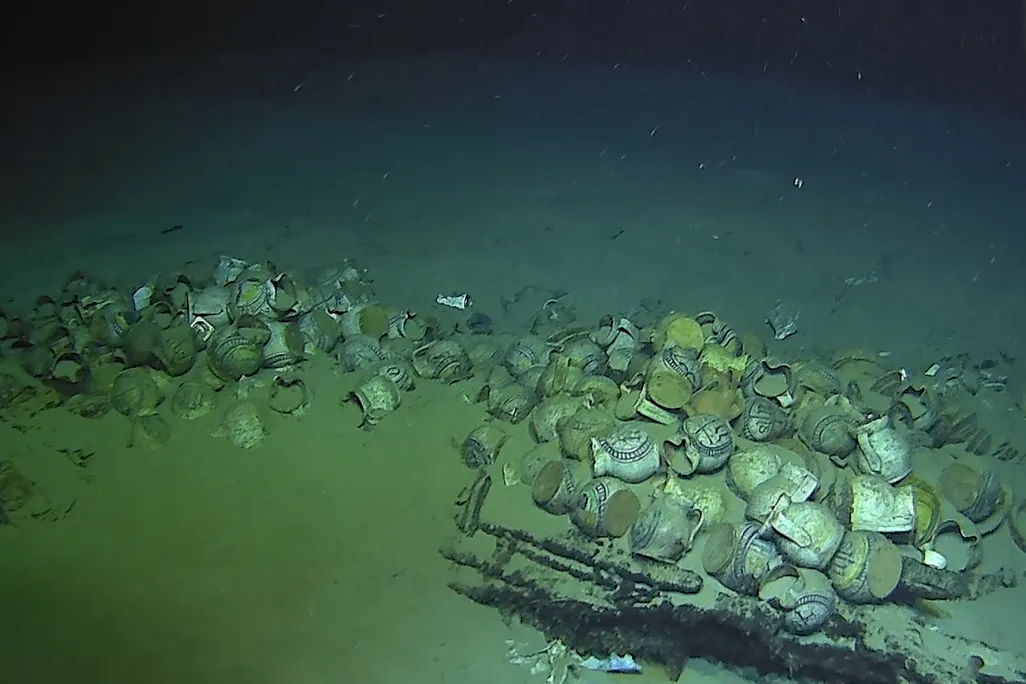 Underwater shipwreck jugs and plates