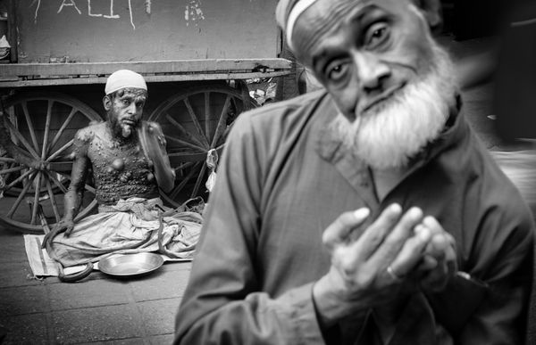 A leprous man and a beggar. Nizamuddin West, Delhi, 2018. thumbnail