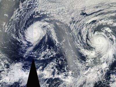 Satellite view of Hurricanes Iselle (left) and Julio (right) approaching Hawaii. From NASA's Aqua satellite