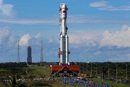 The new Long March 7 rocket makes its way to the launch pad at Wenchang.