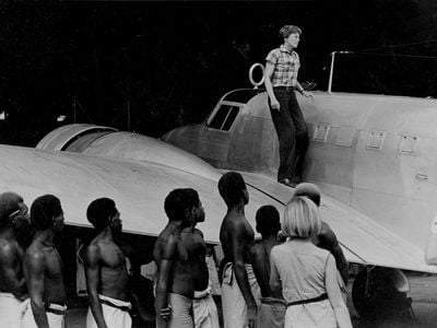 Amelia Earhart on the wing of her plane