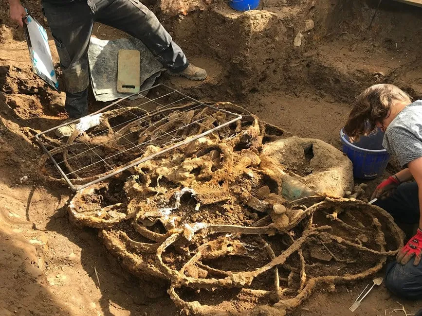 Archaeologists digging up Iron Age artifacts
