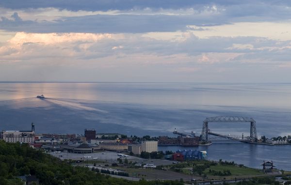 A Great Lake's vessel heads out on Lake Superior from Duluth, Minnesota. thumbnail
