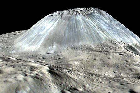 Ahuna Mons, shown in this simulated view as it might appear to someone standing on the surface of Ceres, is thought to be an ice volcano. 