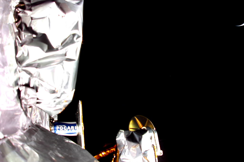 An image of the side of a spacecraft in space