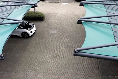 This year, the Solar Cloth Company unveiled the world's first solar fabric tensile structure parking lot in Cambridge, UK.