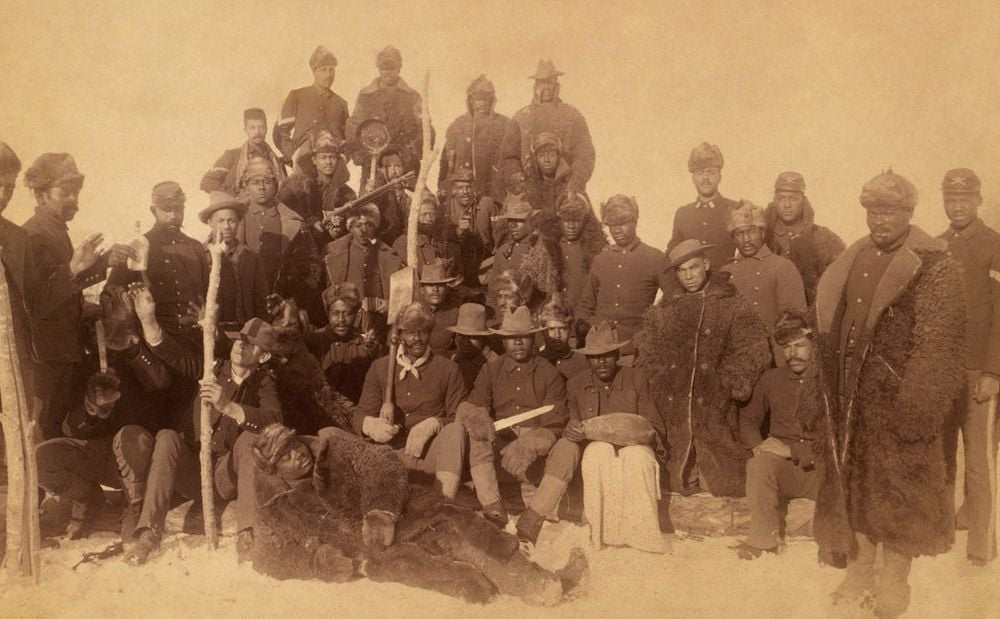 Buffalo soldiers of the 25th Infantry, some wearing buffalo robes, Ft. Keogh, Montana