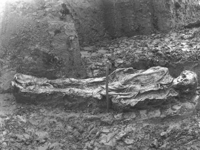 The first bog body ever photographed, which was discovered in Denmark in 1898.