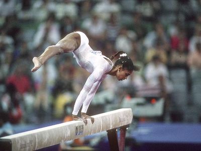 Gymnast Dominique Dawes competes on the balance beam during the 1992 Summer Olympics in Barcelona.
