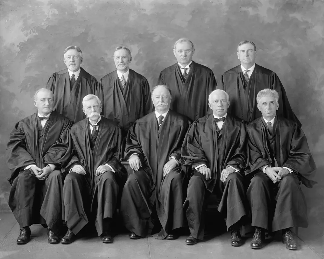 Taft (front row, center) served as chief justice of the Supreme Court between 1921 and 1930.