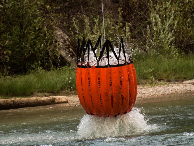 Fire Fighting Helicopter with full Bucket of Water Smithsonian Photo