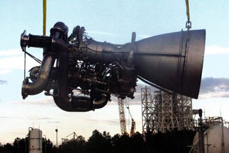 Flying at last: an AJ26/NK-33 engine gets hoisted into place.