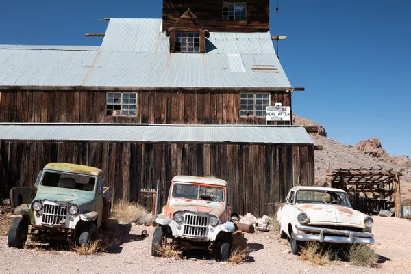 Three old cars before a barn thumbnail
