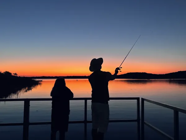 Father and Son Fishing at Sunrise thumbnail