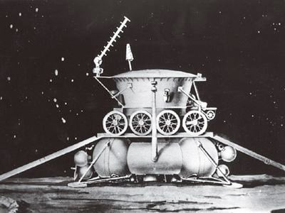 Artist's conception of the Lunokhod rover about to descend ramps from the landing module.