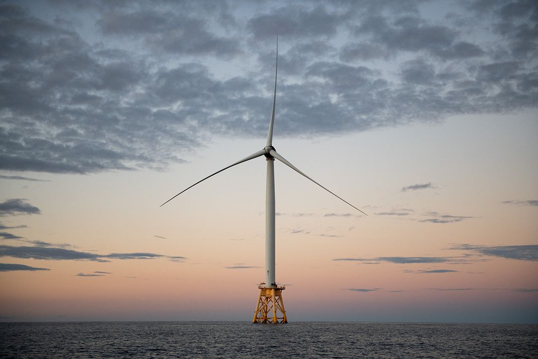 Wind turbine at sunset