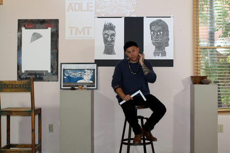 Ian Kuali'i with some of his cut-paper art, June 2019. (Courtesy of the artist)