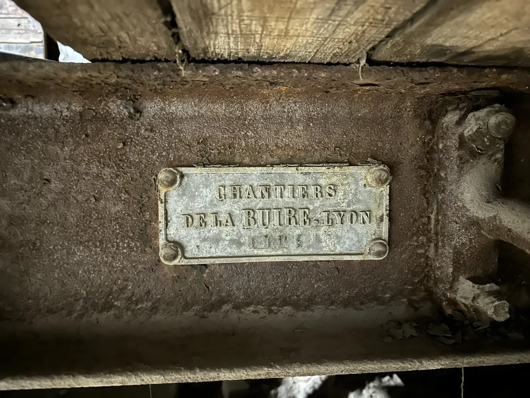 Metal plate with French words