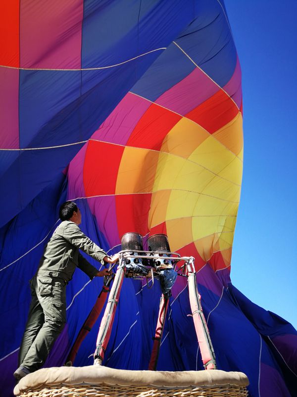 Deflating a hot air balloon in southwest China thumbnail