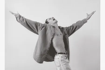 The enthralling c. 1993 portrait of Anthony by ADÁL (detail above), face and palms to the sky, captures the performer’s signature flair.