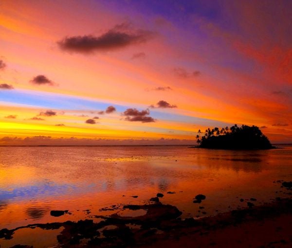Painted skies at sunrise in Rarotonga, Cook Islands thumbnail