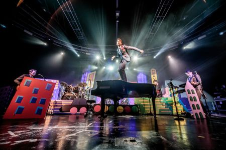 Lebanese-British singer-songwriter Mika performs atop a piano at Fabrique in Milan this June.